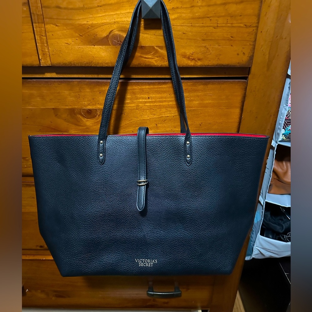 Black and red Victoria’s Secret faux leather tote bag
